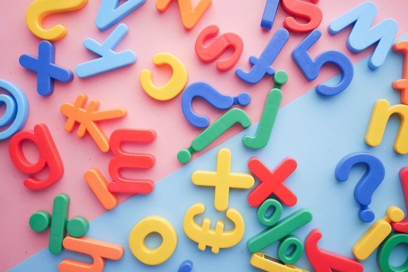 Photo of colorful plastic toy letters by Towfiqu barbhuiya from Unsplash